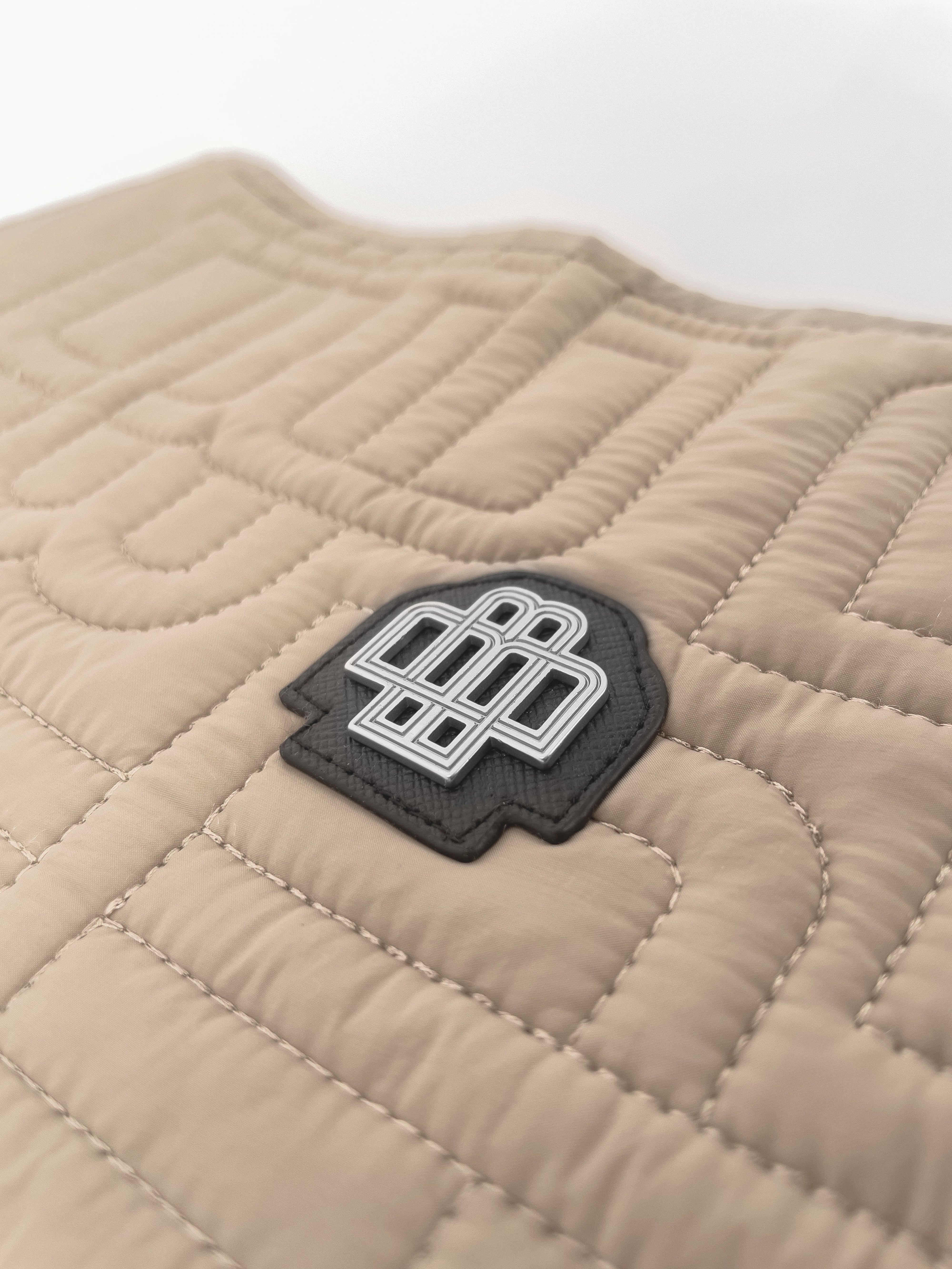 MONOGRAM QUILTED VEST | Braun