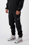 INITIAL TECH TRACKPANTS | Schwarz