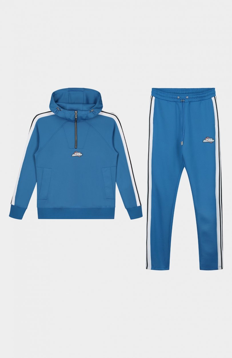 //blackbananas.com/cdn/shop/files/astro-tracksuit-blue_{width}x.jpg?v=1628077248